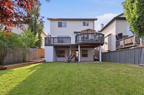 307 Hidden Cove Nw, Calgary, AB - Outdoor With Deck Patio Veranda