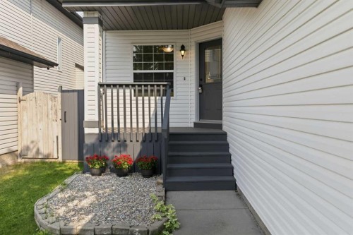 307 Hidden Cove Nw, Calgary, AB - Outdoor With Deck Patio Veranda With Exterior