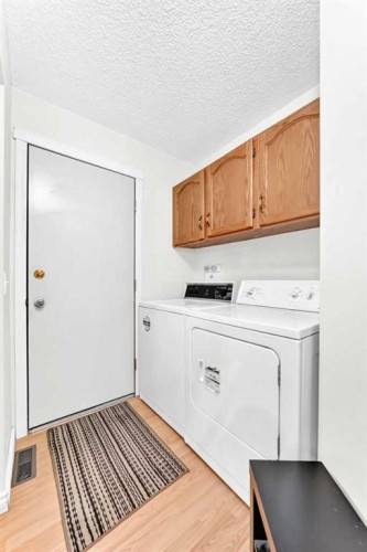 216 Millbank Road Sw, Calgary, AB - Indoor Photo Showing Laundry Room