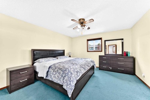 216 Millbank Road Sw, Calgary, AB - Indoor Photo Showing Bedroom