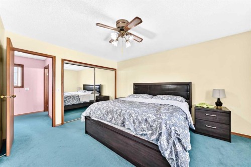 216 Millbank Road Sw, Calgary, AB - Indoor Photo Showing Bedroom