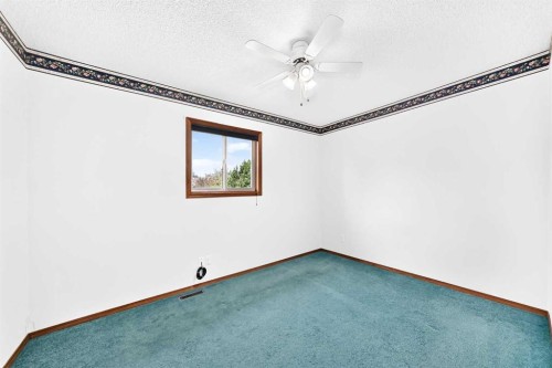 216 Millbank Road Sw, Calgary, AB - Indoor Photo Showing Other Room