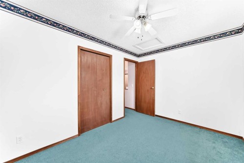 216 Millbank Road Sw, Calgary, AB - Indoor Photo Showing Other Room
