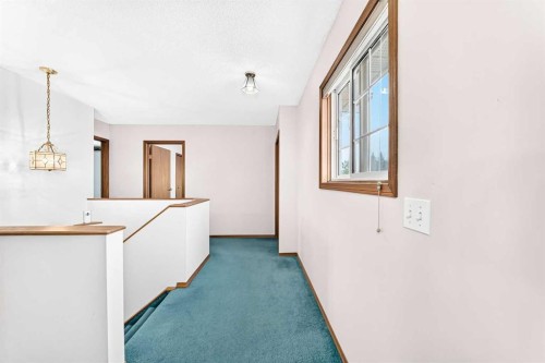 216 Millbank Road Sw, Calgary, AB - Indoor Photo Showing Other Room