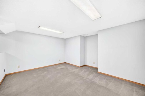 216 Millbank Road Sw, Calgary, AB - Indoor Photo Showing Other Room
