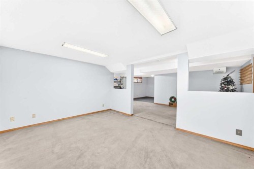 216 Millbank Road Sw, Calgary, AB - Indoor Photo Showing Other Room