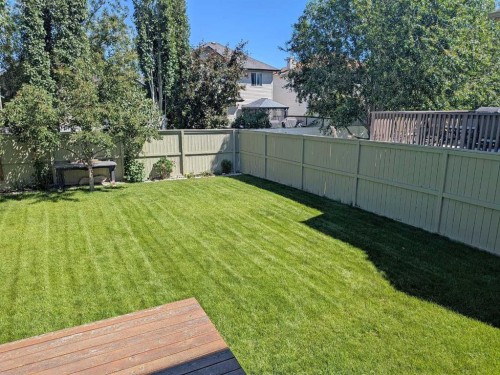 34 Coopers Close Sw, Airdrie, AB - Outdoor With Deck Patio Veranda