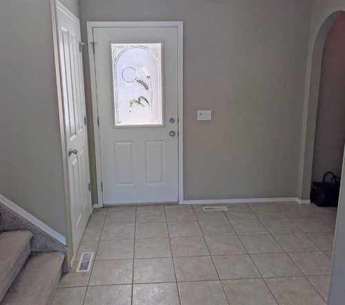 34 Coopers Close Sw, Airdrie, AB - Indoor Photo Showing Other Room