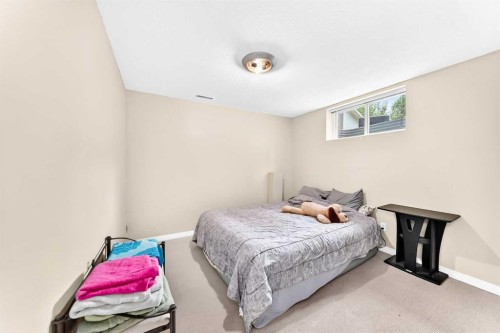 256 Midvalley Place Se, Calgary, AB - Indoor Photo Showing Bedroom