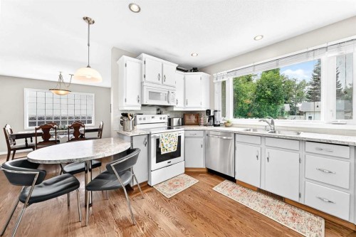 256 Midvalley Place Se, Calgary, AB - Indoor Photo Showing Kitchen With Double Sink
