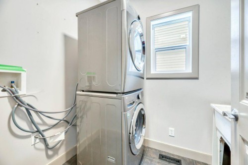 101 Hawkmere Place, Chestermere, AB - Indoor Photo Showing Laundry Room