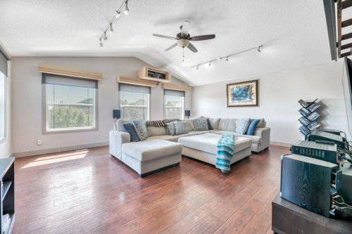 101 Hawkmere Place, Chestermere, AB - Indoor Photo Showing Living Room