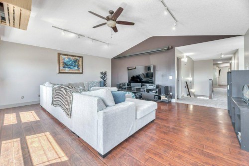 101 Hawkmere Place, Chestermere, AB - Indoor Photo Showing Living Room