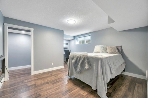 101 Hawkmere Place, Chestermere, AB - Indoor Photo Showing Bedroom