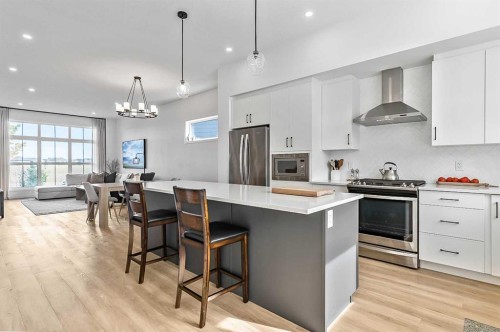 99 Masters Road Se, Calgary, AB - Indoor Photo Showing Kitchen With Upgraded Kitchen