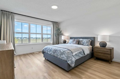 99 Masters Road Se, Calgary, AB - Indoor Photo Showing Bedroom