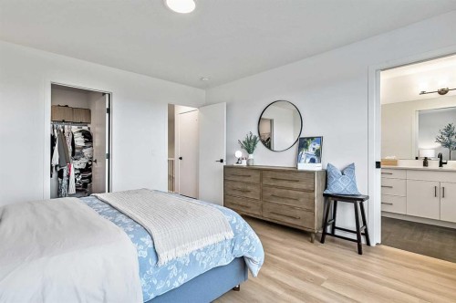 99 Masters Road Se, Calgary, AB - Indoor Photo Showing Bedroom