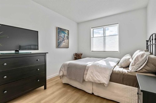 99 Masters Road Se, Calgary, AB - Indoor Photo Showing Bedroom
