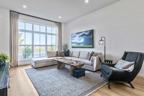 99 Masters Road Se, Calgary, AB - Indoor Photo Showing Living Room