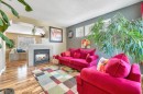 243 Westchester Boulevard, Chestermere, AB  - Indoor Photo Showing Living Room With Fireplace 
