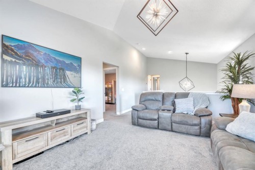 303 Dawson Harbour Court, Chestermere, AB - Indoor Photo Showing Living Room