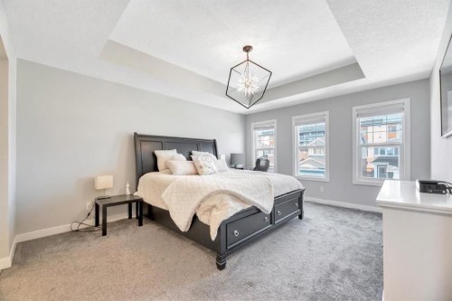 303 Dawson Harbour Court, Chestermere, AB - Indoor Photo Showing Bedroom