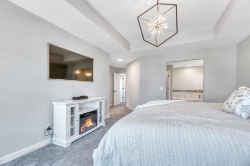 303 Dawson Harbour Court, Chestermere, AB - Indoor Photo Showing Bedroom