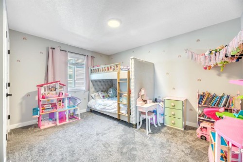 303 Dawson Harbour Court, Chestermere, AB - Indoor Photo Showing Bedroom