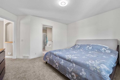 92 Cranston Drive Se, Calgary, AB - Indoor Photo Showing Bedroom