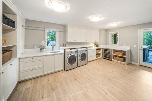 27 Snowberry Gate, Rural Rocky View County, AB - Indoor Photo Showing Laundry Room