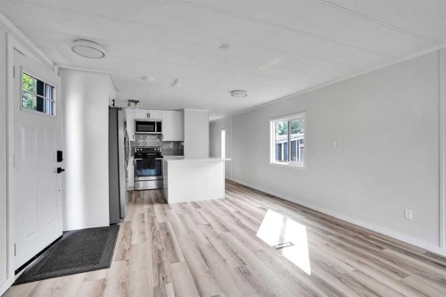 64 Huntwell Way Ne, Calgary, AB - Indoor Photo Showing Other Room