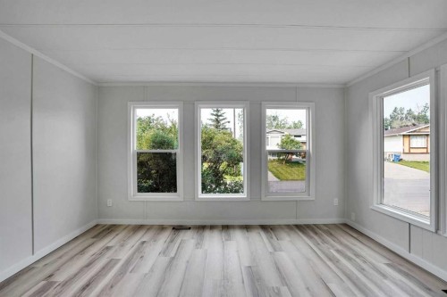 64 Huntwell Way Ne, Calgary, AB - Indoor Photo Showing Other Room