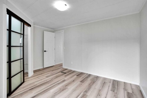 64 Huntwell Way Ne, Calgary, AB - Indoor Photo Showing Other Room