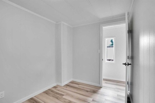 64 Huntwell Way Ne, Calgary, AB - Indoor Photo Showing Other Room