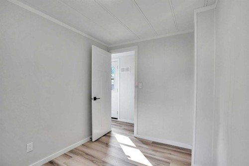 64 Huntwell Way Ne, Calgary, AB - Indoor Photo Showing Other Room