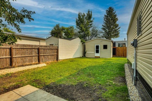 64 Huntwell Way Ne, Calgary, AB - Outdoor