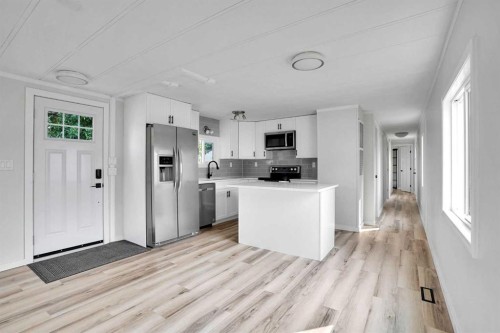 64 Huntwell Way Ne, Calgary, AB - Indoor Photo Showing Kitchen