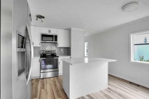 64 Huntwell Way Ne, Calgary, AB - Indoor Photo Showing Kitchen