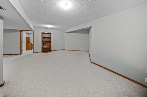 30 Gleneagles View, Cochrane, AB - Indoor Photo Showing Other Room
