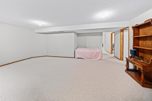 30 Gleneagles View, Cochrane, AB - Indoor Photo Showing Other Room