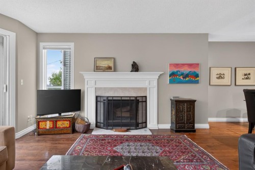 1924 29 Avenue South, Calgary, AB - Indoor Photo Showing Living Room With Fireplace