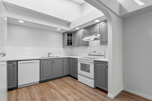 162 Millbank Hill Sw, Calgary, AB - Indoor Photo Showing Kitchen With Double Sink