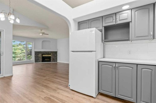 162 Millbank Hill Sw, Calgary, AB - Indoor With Fireplace