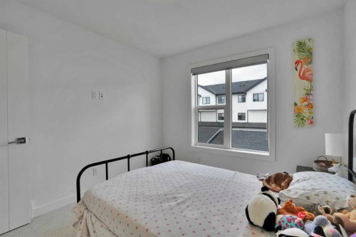 76 Amblefield Terrace Nw, Calgary, AB - Indoor Photo Showing Bedroom