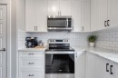 11 Sage Bluff Gate Nw, Calgary, AB  - Indoor Photo Showing Kitchen With Upgraded Kitchen 