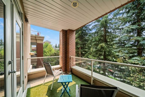4203-24 Hemlock Crescent Sw, Calgary, AB - Outdoor With Deck Patio Veranda With Exterior