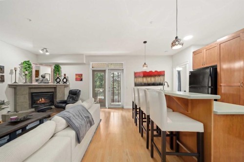 4203-24 Hemlock Crescent Sw, Calgary, AB - Indoor With Fireplace