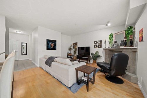 4203-24 Hemlock Crescent Sw, Calgary, AB - Indoor Photo Showing Living Room