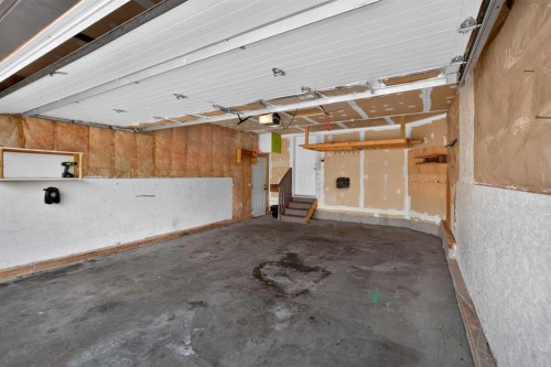 126 Bridlewood Way Sw, Calgary, AB -  Photo Showing Garage