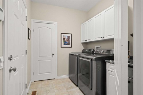 51 Elysian Crescent Sw, Calgary, AB - Indoor Photo Showing Laundry Room